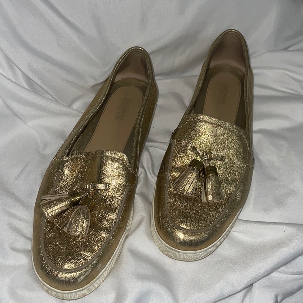 Gold loafers size 8M with two tassels with white sole